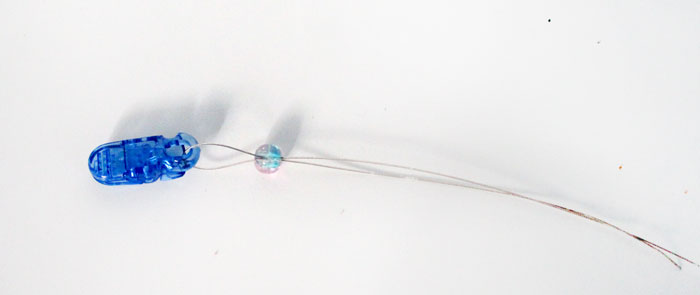 How to make a beaded pacifier holder - a new, fun tutorial! Make a DIY pacifier clip as a great easy baby shower gift, but first learn how to make it safely!