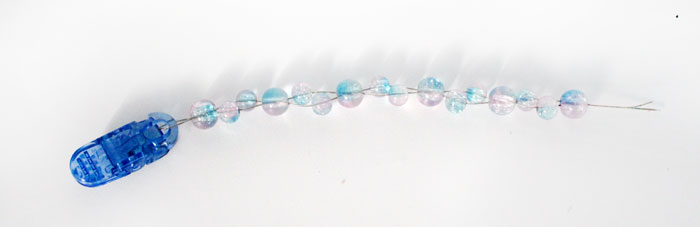 How to make a beaded pacifier holder - a new, fun tutorial! Make a DIY pacifier clip as a great easy baby shower gift, but first learn how to make it safely!