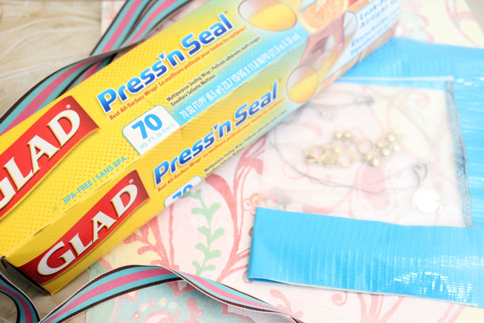 OMG you won't believe how well this works! Make  a super easy, quick, no-sew DIY jewelry roll for tangle-free travel using Glad Press 'n Seal!  An easy life hack to go with your jewelry making crafts. 