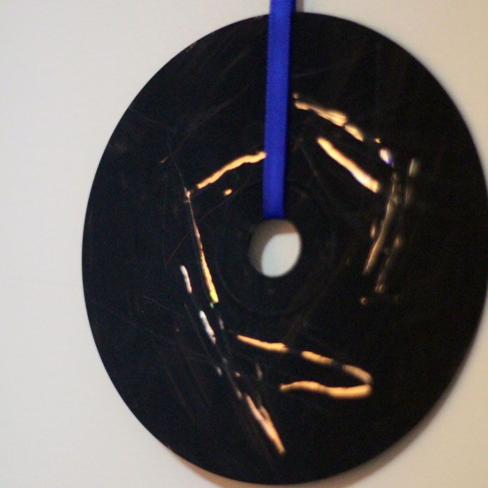 Upcycle old CDs and DVDs as doodle discs! Such a fun, easy craft for kids and adults of all ages!