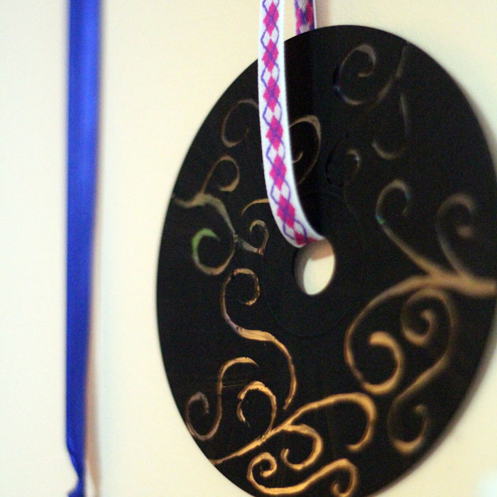 Upcycle old CDs and DVDs as doodle discs! Such a fun, easy craft for kids and adults of all ages!