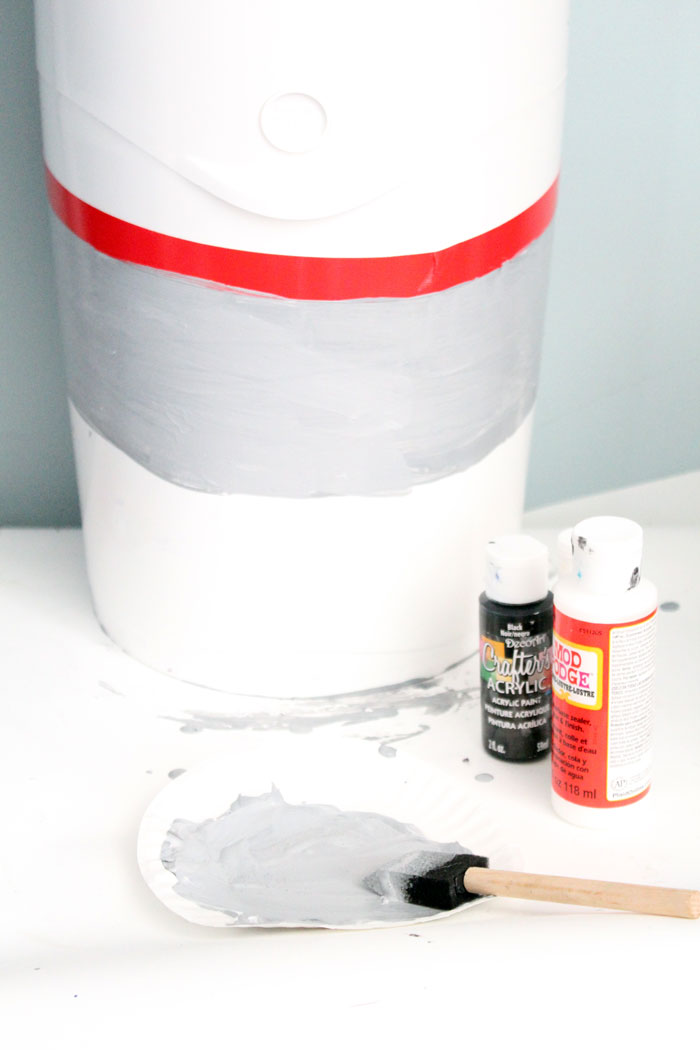Check out this amazing, simple tutorial to decorate a diaper genie! Such a genius idea for DIY nursery decor that is also functional, and an easy, doable craft for moms and new baby.