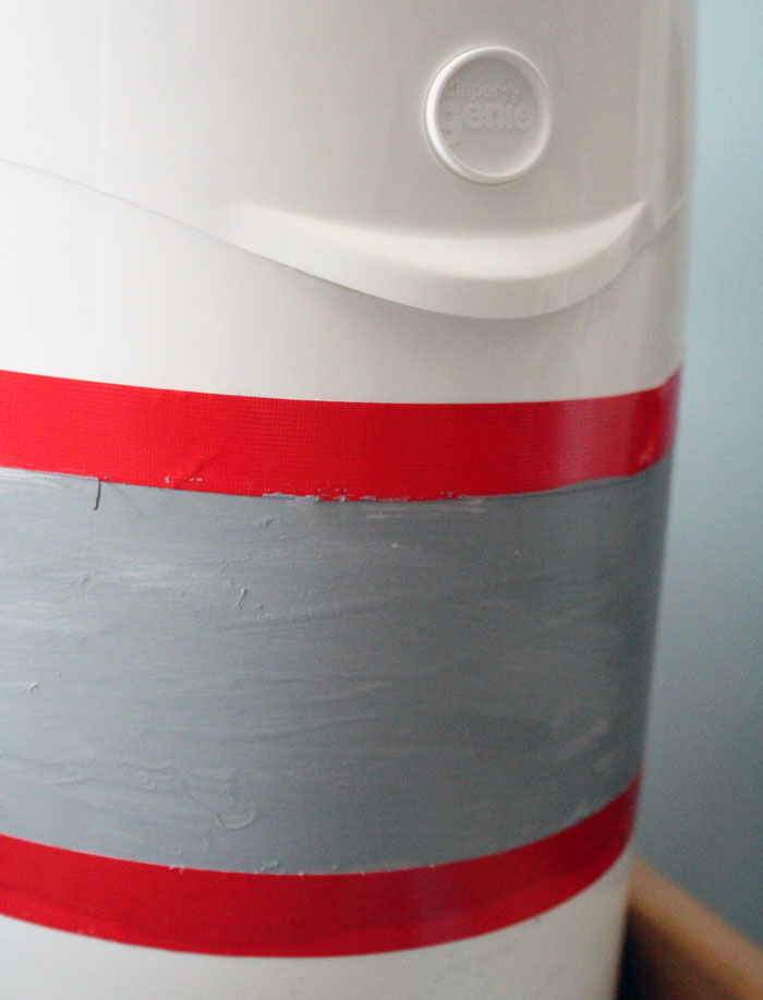 Check out this amazing, simple tutorial to decorate a diaper genie! Such a genius idea for DIY nursery decor that is also functional, and an easy, doable craft for moms and new baby.
