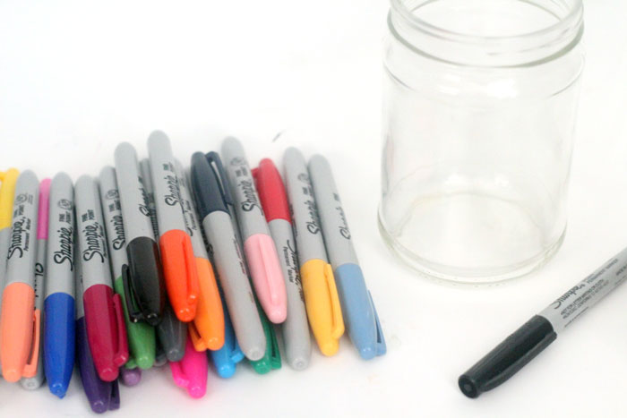 Relax with this adorable way to upcycle jars! This dots 'n doodles jar craft is a fun DIY project to help moms (or anyone) unwind. 