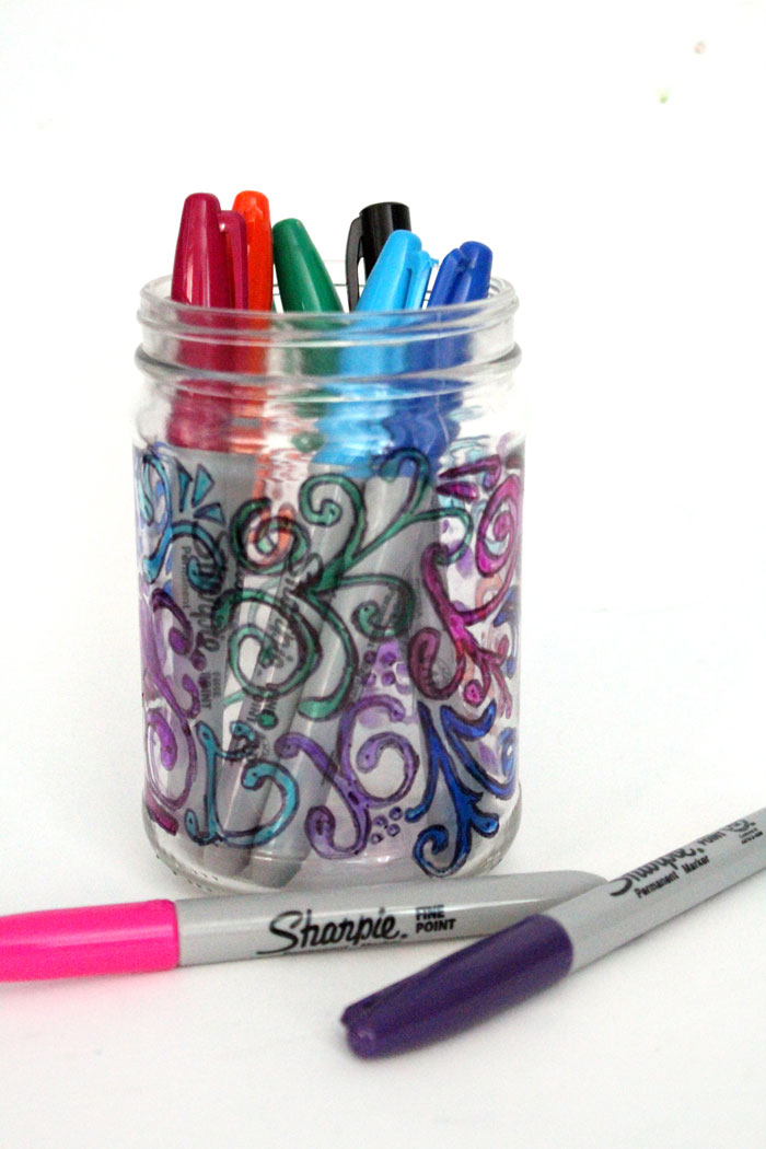 Relax with this adorable way to upcycle jars! This dots 'n doodles jar craft is a fun DIY project to help moms (or anyone) unwind.