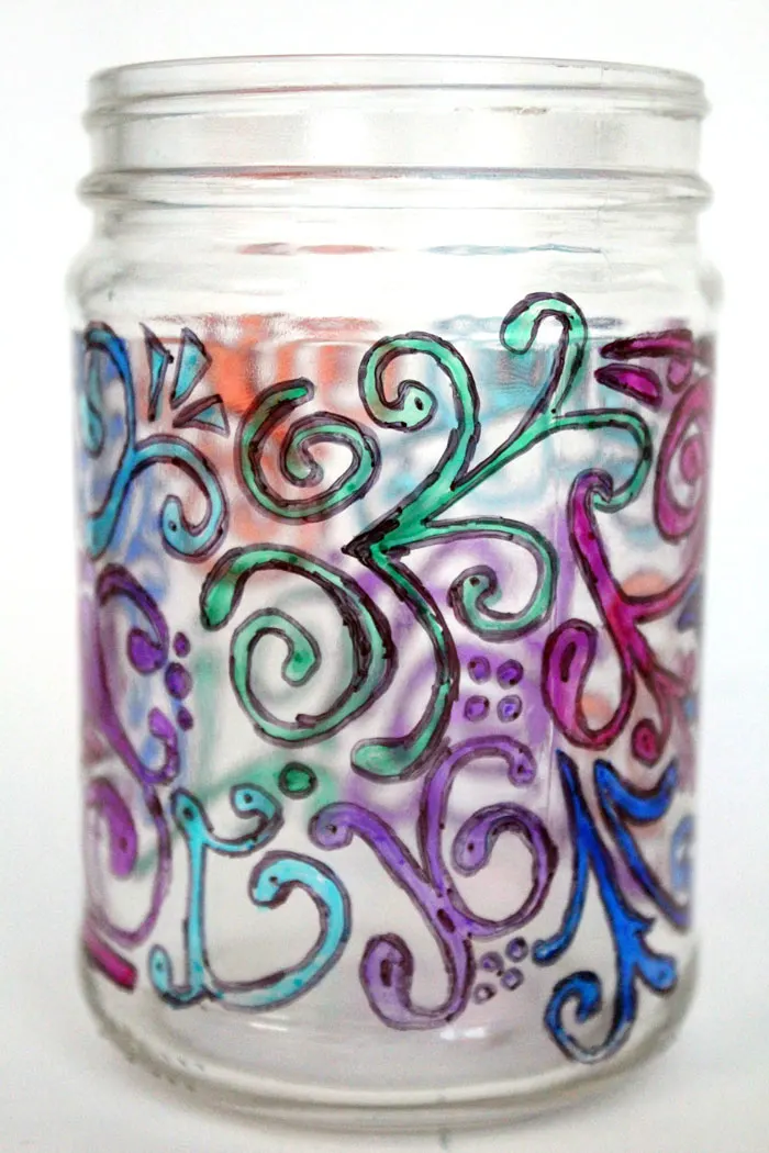 Relax with this adorable way to upcycle jars! This dots 'n doodles jar craft is a fun DIY project to help moms (or anyone) unwind. 