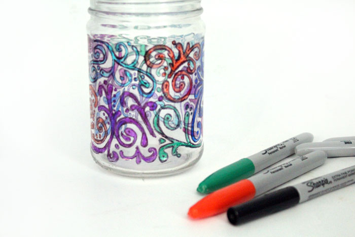 Relax with this adorable way to upcycle jars! This dots 'n doodles jar craft is a fun DIY project to help moms (or anyone) unwind. 