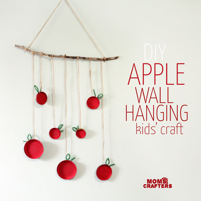 Make this beautiful apple wall hanging - an easy, pretty apple craft for kids! Make it for the Jewish High Holidays, or make it as an autumn craft. Either way, your kid will love this DIY wall art.