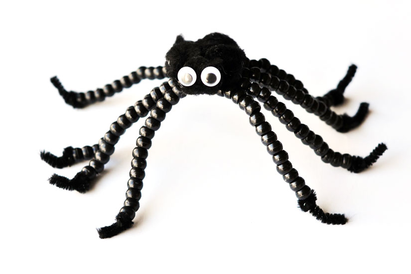 Isn't this not-so-spooky spider adorable? Make a beaded spider kids' craft for Halloween or any time of year!