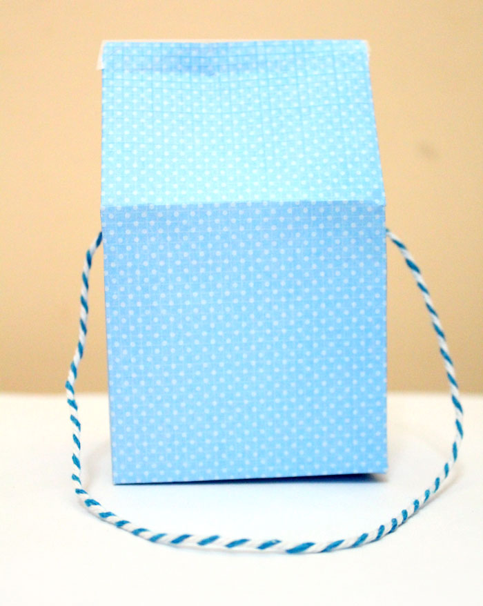 Make these adorable DIY Milk Carton Treat Box or bags with the free printable template! They are perfect for halloweeen, birthday parties, or any favors or gifts