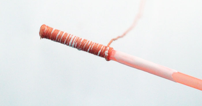 Make these beautiful DIY string wrapped beads and then make your own jewelry with them! It's an easy jewelry making craft for kids, teens, or beginners.