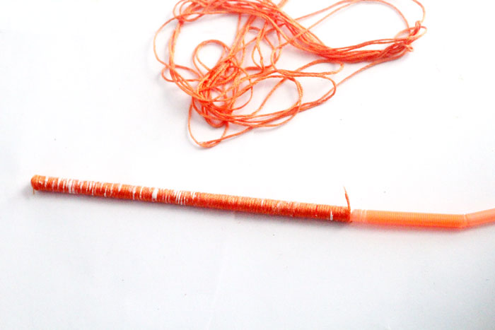 Make these beautiful DIY string wrapped beads and then make your own jewelry with them! It's an easy jewelry making craft for kids, teens, or beginners.