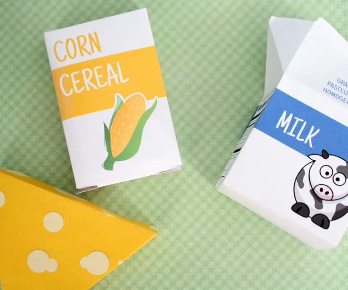 Oh, these are so stinkin' cute - and you can print it for free! Free printable groceries for pretend play and fun kids activities - including cereal, milk, and cheese. Print the designs or make your own.