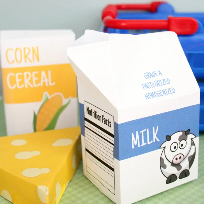 Oh, these are so stinkin' cute - and you can print it for free! Free printable groceries for pretend play and fun kids activities - including cereal, milk, and cheese. Print the designs or make your own.