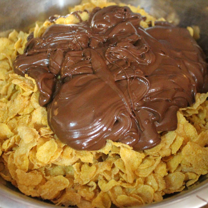 Delicious peanut butter corn flake clusters are a delicious take on a classic easy dessert or snack! Click for this 3 ingredient really easy recipe!