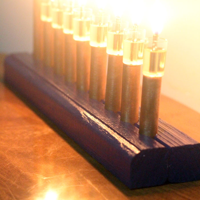 Magnificent DIY wood and copper menorah - cool craft for Hanukkah or Chanukah. Or just use it as any special event centerpiece!