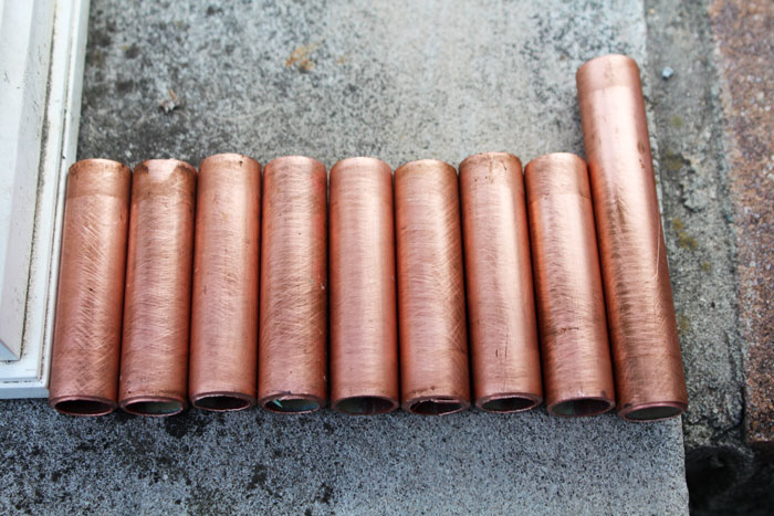 Magnificent DIY wood and copper menorah - cool craft for Hanukkah or Chanukah. Or just use it as any special event centerpiece!