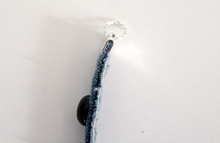 Make this simple no sew DIY denim bracelet by using recycled jeans! This easy jewelry making tutorial is a perfect. cool craft for teens and tweens.
