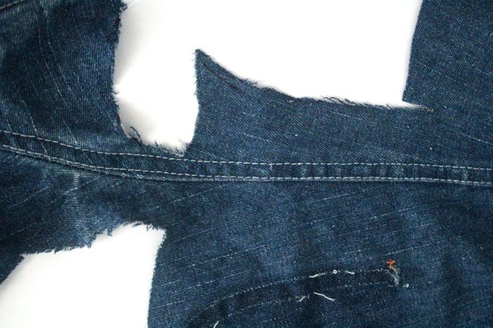 Make this simple no sew DIY denim bracelet by using recycled jeans! This easy jewelry making tutorial is a perfect. cool craft for teens and tweens.