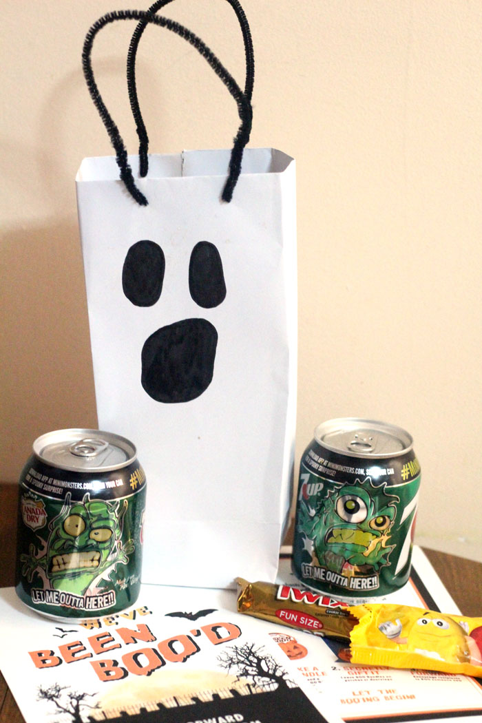 Make this spooky ghost treat bag to BOO a friend for Halloween! A simple craft for kids to get them involved, plus a free printable BOO card.