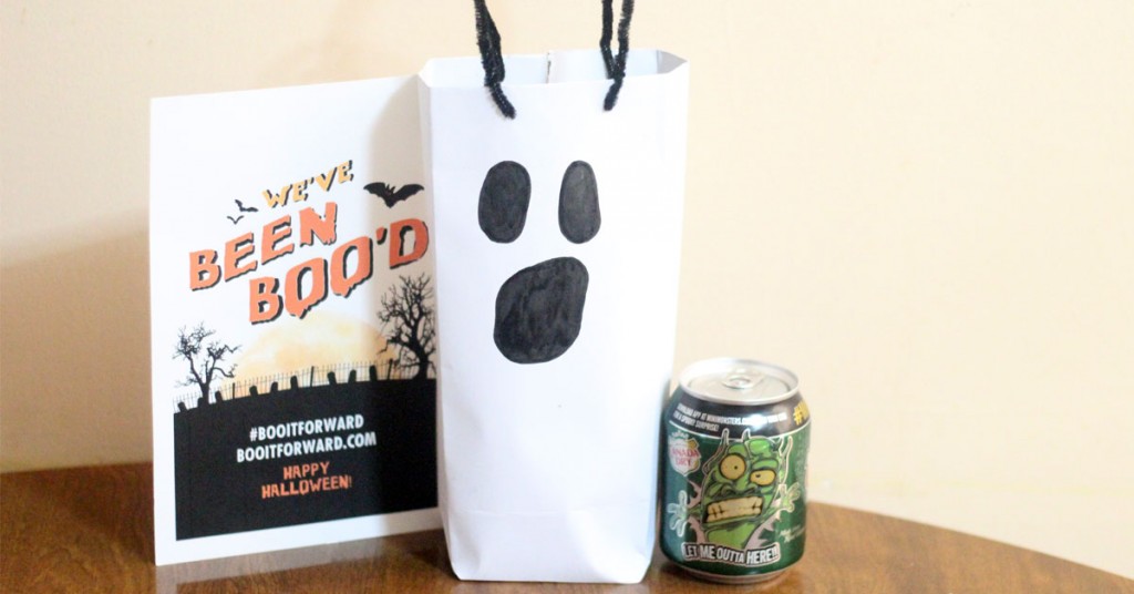 Make this spooky ghost treat bag to BOO a friend for Halloween! A simple craft for kids to get them involved, plus a free printable BOO card.