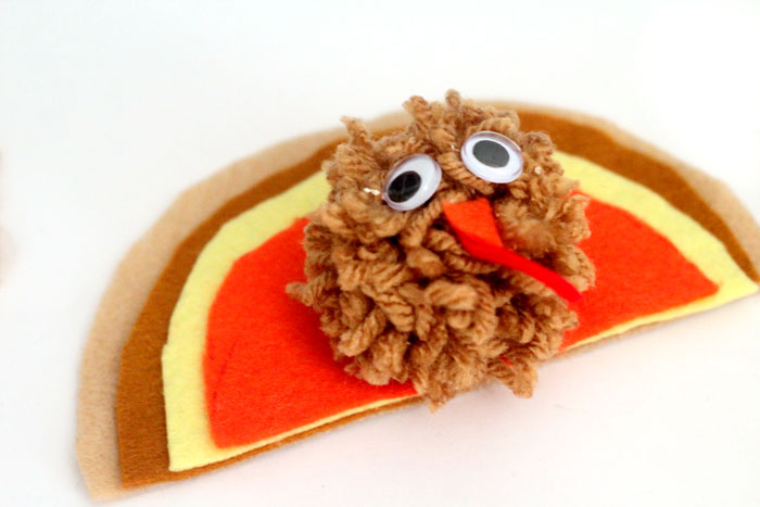 It's so easy to make this adorable pompom Thanksgiving turkey crafts for kids! It can be used as a toy, a napkin ring, a centerpiece, and other fun ideas. Love the DIY pom pom - I need to do it this autumn.