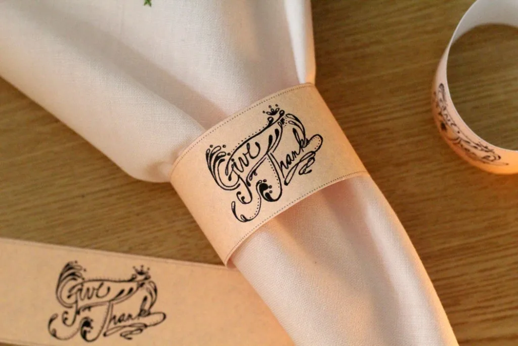 Print these adorable Thanksgiving napkin rings for your holiday table! Black and white, and cheap to print! The design is even hand-drawn - how cool!