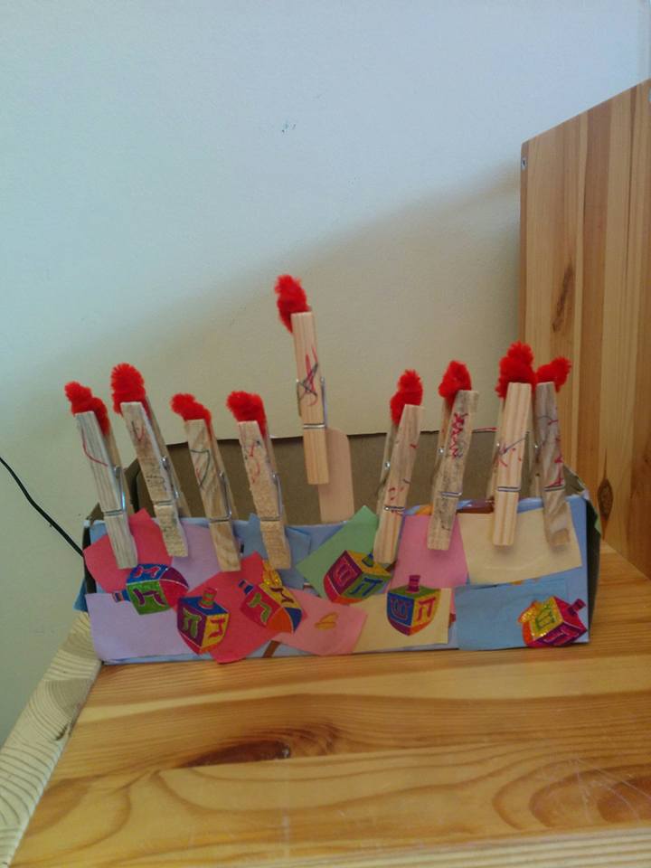 Make this adorable Hanukkah Menorah craft for kids. It's an adorable DIY toy menorah that I made for my toddler to light on Chanukah.
