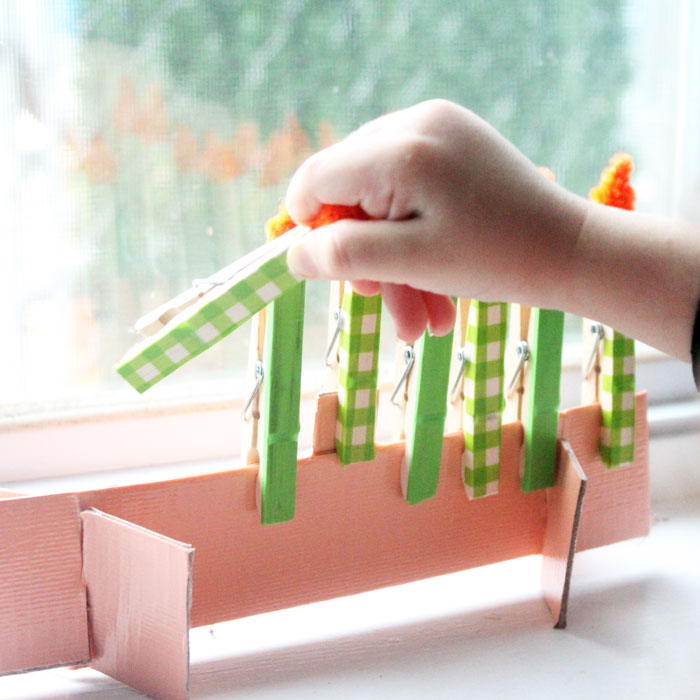 Make this adorable Hanukkah Menorah craft for kids. It's an adorable DIY toy menorah that I made for my toddler to light on Chanukah.