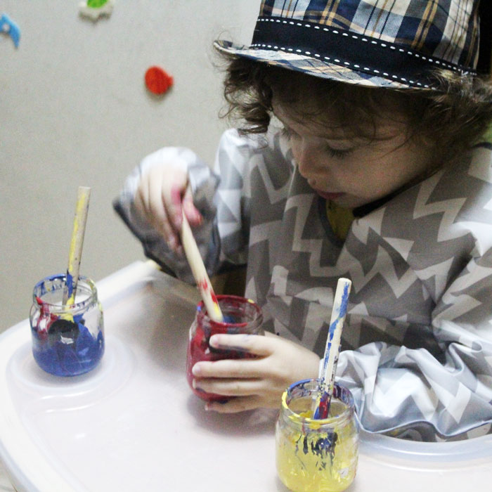 These primary color luminaries are 100% made by toddlers! Click to see how this neat toddler painting activity and craft is done.