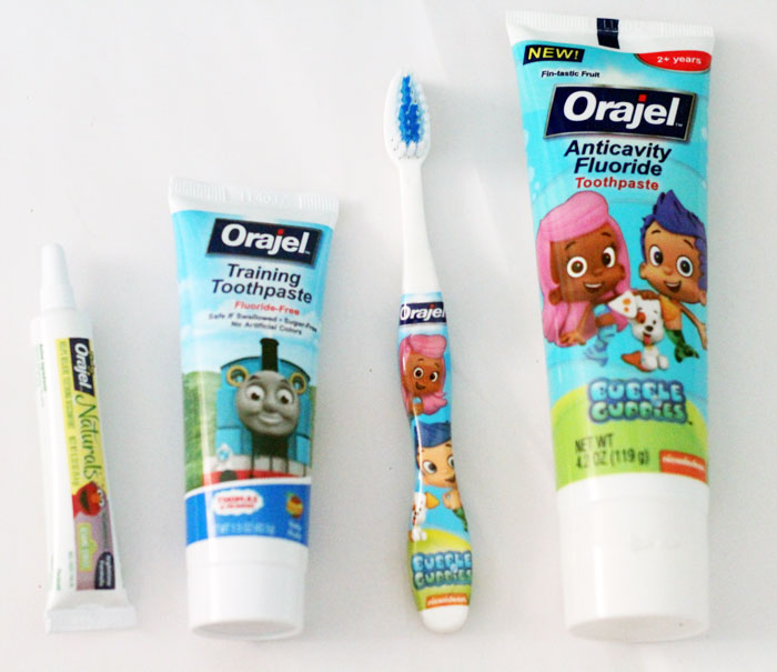 Got a toddler who resists brushing her teeth? Read these mom to mom tooth brushing tips for toddlers - positive parenting has never been more effective! 