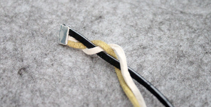 I love this braided leather bracelet - isn't it cool? It's a really cool craft for teen boys or girls, and also a great DIY gift idea for guys, or beginner jewelry making project.