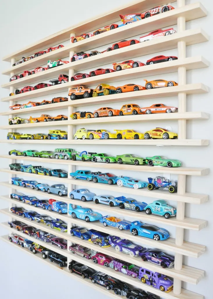 Got too many toy cars and matchbox cars? Check out these 11 genius hot wheels display ideas - they double as storage and organization but they are also beautiful as playroom decor!