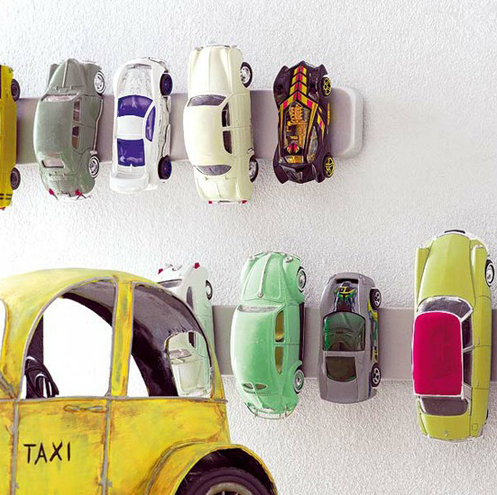 Got too many toy cars and matchbox cars? Check out these 11 genius hot wheels display ideas - they double as storage and organization but they are also beautiful as playroom decor!