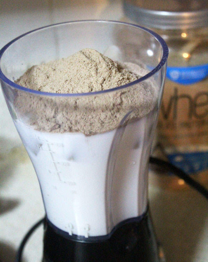 Make this WICKED protein shake recipe - you'll never guess it's your protein fix for the day! It has a double does of chocolate, plus peanut butter flavor, and is rich and filling.