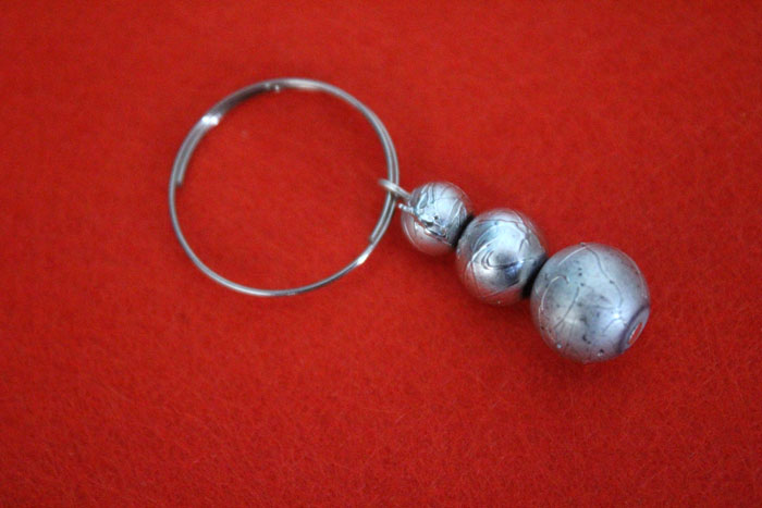 Make these easy and elegant DIY snowman stemware charms to upgrade your holiday or winter tablescape! These wine glass dangles are so pretty and easy to craft, and are perfect for Christmas, New Year's or any winter party.