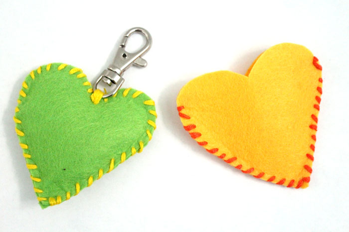 Make this adorable stitched felt craft for Valentine's day or any time of year! It includes a cute favor pouch version, and a plush heart keychain. IT's a great beginner sewing project for kids, teens, and tweens!