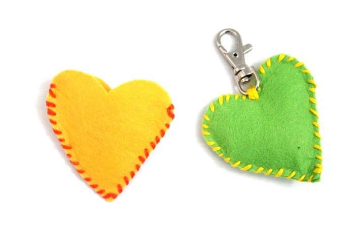 Make this adorable stitched felt craft for Valentine's day or any time of year! It includes a cute favor pouch version, and a plush heart keychain. IT's a great beginner sewing project for kids, teens, and tweens!