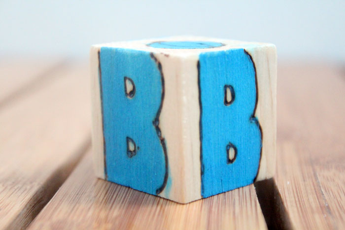 These colorful wooden alphabet blocks are surprisingly easy to make! They are so much fun to receive as a DIY baby gift and inexpensive to put together.