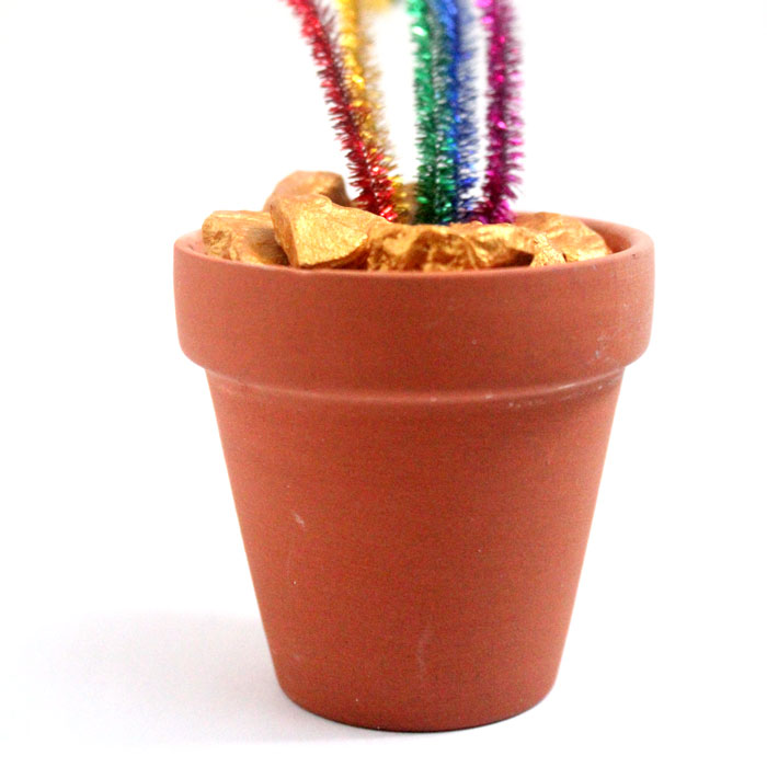 It's a rainbow craft with a twist! Make this pot of gold nuggets for St. Patrick's Day or any day! You can use the gold nuggets alone, add a rainbow if you want, or leave it as is. It's an easy craft for kids, teens, or even adults.