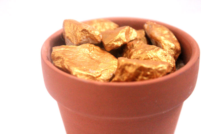 It's a rainbow craft with a twist! Make this pot of gold nuggets for St. Patrick's Day or any day! You can use the gold nuggets alone, add a rainbow if you want, or leave it as is. It's an easy craft for kids, teens, or even adults.