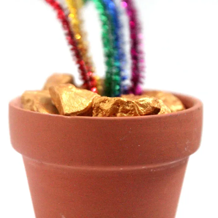 It's a rainbow craft with a twist! Make this pot of gold nuggets for St. Patrick's Day or any day! You can use the gold nuggets alone, add a rainbow if you want, or leave it as is. It's an easy craft for kids, teens, or even adults.