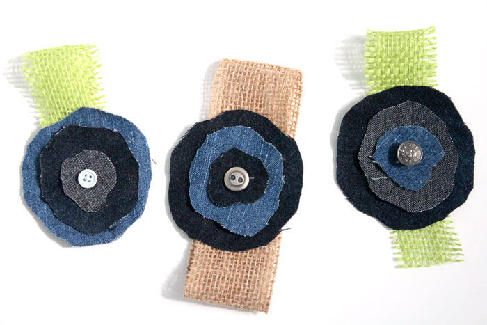 Make these super easy, shabby chic, burlap and recycled denim flowers. Perfect for making DIY accessories like headbands or hair clips, but I used it to update an old onesie. It's also a great way to upcycle and repurpose old jeans and a perfect craft for teens!