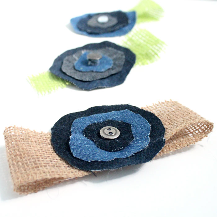 Make these super easy, shabby chic, burlap and recycled denim flowers. Perfect for making DIY accessories like headbands or hair clips, but I used it to update an old onesie. It's also a great way to upcycle and repurpose old jeans and a perfect craft for teens!