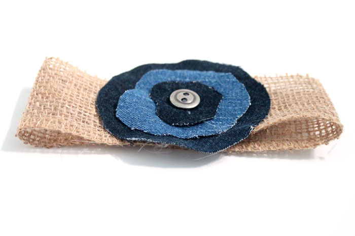 Make these super easy, shabby chic, burlap and recycled denim flowers. Perfect for making DIY accessories like headbands or hair clips, but I used it to update an old onesie. It's also a great way to upcycle and repurpose old jeans and a perfect craft for teens!