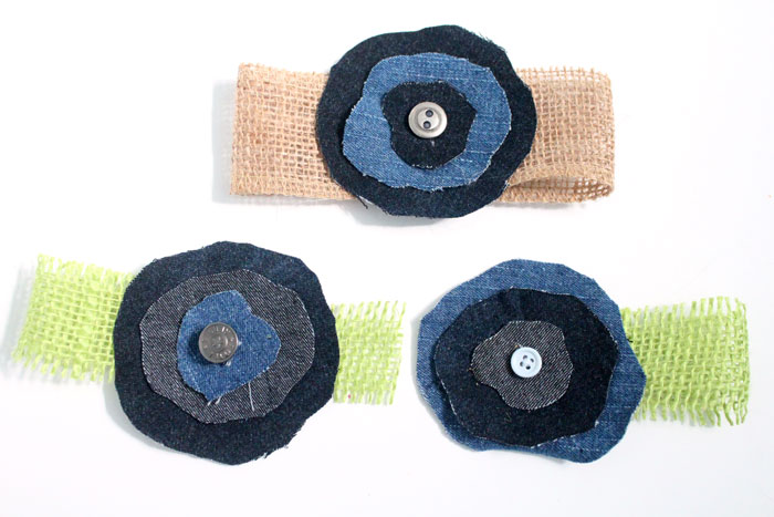 Make these super easy, shabby chic, burlap and recycled denim flowers. Perfect for making DIY accessories like headbands or hair clips, but I used it to update an old onesie. It's also a great way to upcycle and repurpose old jeans and a perfect craft for teens!