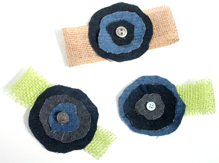 Make these super easy, shabby chic, burlap and recycled denim flowers. Perfect for making DIY accessories like headbands or hair clips, but I used it to update an old onesie. It's also a great way to upcycle and repurpose old jeans and a perfect craft for teens!