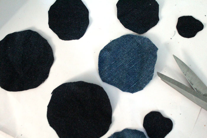 Make these super easy DIY recycled denim flowers. Perfect for making DIY accessories like headbands or hair clips, but I used it to update an old onesie. It's also a great way to upcycle and repurpose old jeans and a perfect craft for teens!