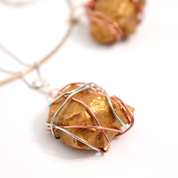 This DIY gold nugget jewelry is so easy to make and one of the cheapest jewelry making tutorials I've seen! Such an easy rock craft and teaches basic wire wrapping to make the pendants. The earrings take literally five minutes.