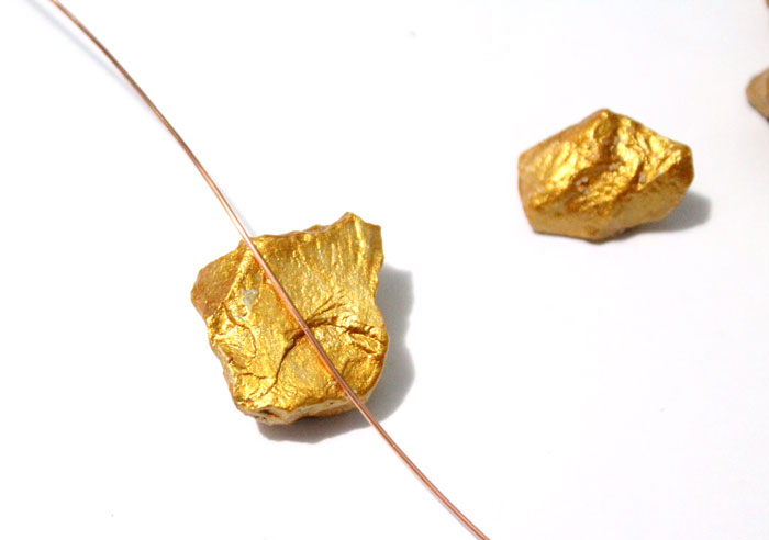 This DIY gold nugget jewelry is so easy to make and one of the cheapest jewelry making tutorials I've seen! Such an easy rock craft and teaches basic wire wrapping to make the pendants. The earrings take literally five minutes.